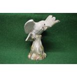 Meissen figure of a parrot perched on a tree stump - 9" tall