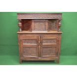 19th century oak court cupboard the top having central cupboard door and two bulbous columns over