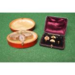 Four 18ct gold studs together with one unmarked stud and 9ct gold ladies watch bearing the name C
