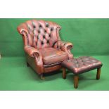 20th century red leather button back armchair together with a button leather topped foot stool with