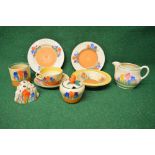 Quantity of Clarice Cliff Crocus pattern ceramics to include: tea cup and saucer, milk jug - 3.