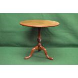Mahogany tip top circular occasional table the top being supported by turned and twist column