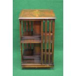 Late 20th century mahogany inlaid revolving bookcase the top having cross banding with moulded edge,