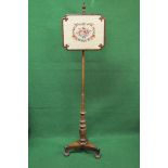 Victorian mahogany pole screen having rectangular screen with shaped corners and embroidered with