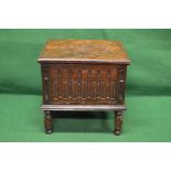 19th century oak chest the top having carved decoration lifting to reveal storage space,