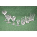 Part suite of Stuart Crystal drinking glasses to comprise: six 7" wine glasses, five 5" goblets,