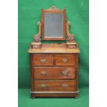 Victorian mahogany dressing chest having rectangular mirror with turned finials,