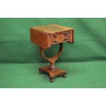 Victorian rosewood work table having two drop flaps with rounded corners over two small drawers