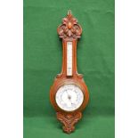 Oak carved Aneroid barometer having white dial - 35.