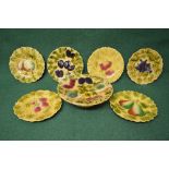 French Sarreguemines dessert set decorated with leaves and fruit to comprise: six 7.5" plates and 9.