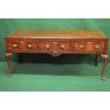 Mahogany three drawer serving table having cross banded top over drawers with brass handles and