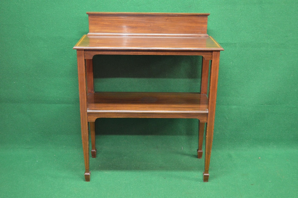 Mahogany inlaid two tier buffet serving table the top having moulded edge and raised back supported