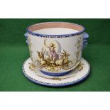 Continental porcelain jardiniere having decorated panel of figure and deers,