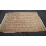 Beige/brown ground rug having cream and black pattern with end tassels - 110" x 77"