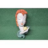 1930's Goldscheider terracotta face plaque of a young lady with red hair and holding an apple in