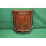 Mahogany cross banded bow fronted side cabinet the door having oval mahogany panel opening to