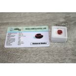 Loose ruby, oval mixed cut, accompanying certificate stating weight as 6.00 carats, measuring 11 x 9