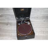 HMV travel type Gramophone plus a collection of vintage 78's & 45's