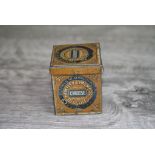 Vintage Miniature Huntley & Palmer Biscuits Advertising Tin on a Brown Ground, 4cms high
