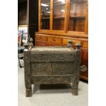 Middle Eastern / Afghan Hardwood Child's Bed / Cupboard, ornately carved to front, upper sleeping