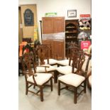 Set of Six Reproduction Chippendale Style Dining Chairs with scroll carved splats and over-stuffed