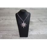 Victorian diamond star pendant necklace, the principle old cut diamond weighing approximately 0.75