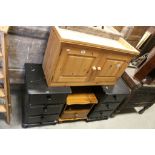 Pair of Black Painted Pine Three Drawer Bedside Cabinets, another Pine Bedside Cabinet and a Pine