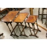 Mahogany Nest of Tables with Ridged Shaped Rims and raised on Spindle Legs