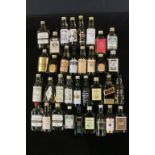 38 Miniature whiskies to include William Lawson Klondyke Gold, Pride of Islay etc.
