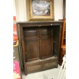 Antique Oak Cupboard (later converted to a wardrobe) with Two Panel Doors above Two Drawers,