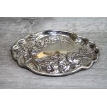 Edwardian silver oval pin tray, repousse floral decoration, wavy border, makers Thomas Bishton,