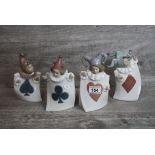 Set of four boxed Nao ceramic figurines dressed as Playing Cards