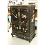 Japanese Style Black Lacquered Cabinet decorated with applied stone figures, birds and flowers on