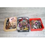 Three boxes of vintage costume jewellery to include bangles, bracelets and necklaces