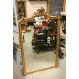 19th century Rococo Style Gilt Wood and Gesso Framed Overmantle Mirror with Asymmetrical Floral C