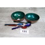 Two Green Enamelled Copper Bowls together with Four Harlequin Enamelled Copper Spoons
