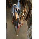 Collection of approximately 15 vintage Umbrellas in a Glass stand