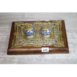 Early 20th century brass inkstand with oak wood base, pierced brass fretwork with two ceramic and