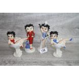 Four boxed Wade ceramic Betty Boop figurines all with COA's