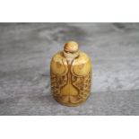 Carved oriental snuff bottle, height approximately 7cm