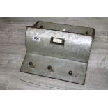 Galvanized Industrial hopper with hanging pegs beneath
