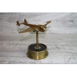 Brass Model of a Handley Page Fighter Airplane set on a plinth made from an instrumental part of a