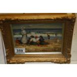 Oil on Panel of a Victorian Beach Scene with Family Gathering