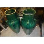 Large pair of Iranian green glazed Wine vessels