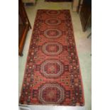 Red Ground Rug with Geometric Pattern, 230cms x 90cms