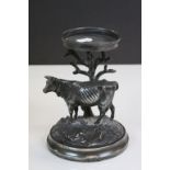 Pewter centerpiece in the form of a Cow with Tree with candle stand above