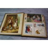 Victorian scrap book containing postcards, greeting cards, Christmas cards and cut-out