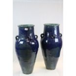 Two large Persian green glazed Wine vessels