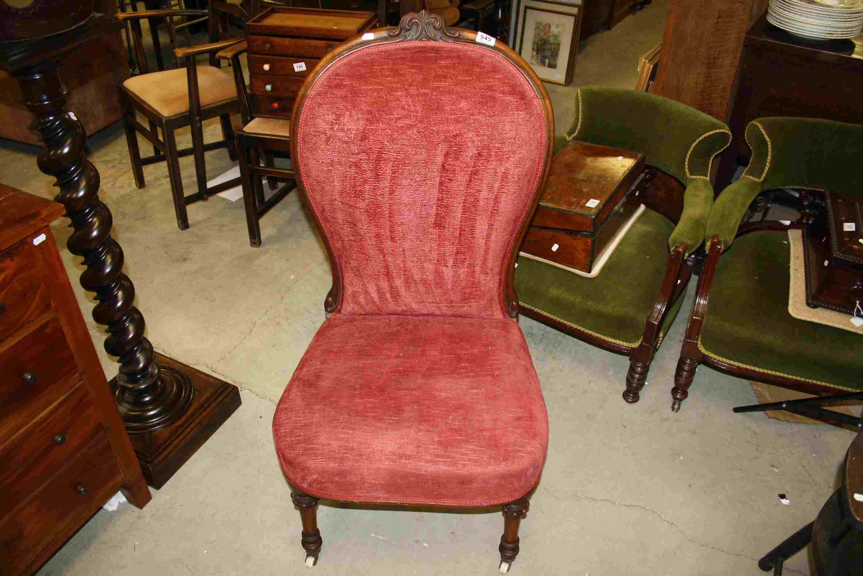 19th century Walnut Framed and Red Upholstered Balloon Back Nursing Chair raised on Turned Front