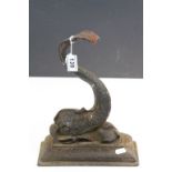 Vintage Cast Iron door stop in the form of a Dolphin